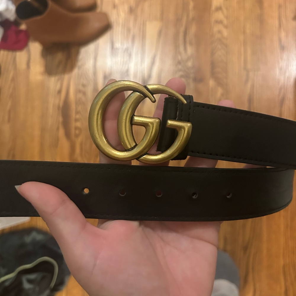 Faux Gucci Black and Gold Belt Bag with Iconic GG Design